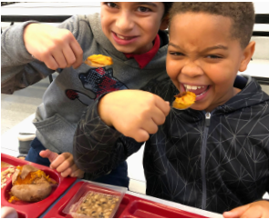 Kids tasting sweet potatoes